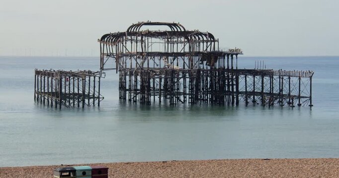 Wide shot of the Dialect Brighton West pier on a Calm day