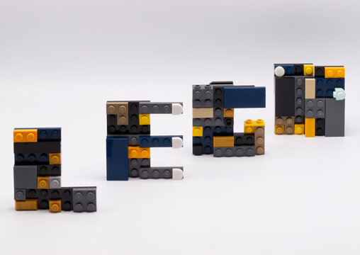 Bologna - Italy - April 14, 2026: Word Lego created from various plastic building blocks isolated on a plain white studio background.
