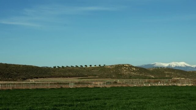 Starting at Moncayo massif with snow moving  across the Spanish countryside