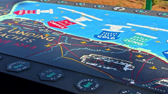 Memorial Map Overlooking Omaha Beach In Colleville-sur-Mer, France, Detailing The D-Day Landing Beaches. High Angle, Panning Shot