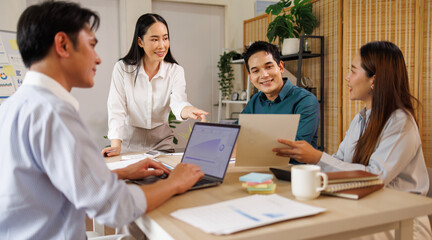 Fototapeta premium Diverse business team collaborating during office meeting