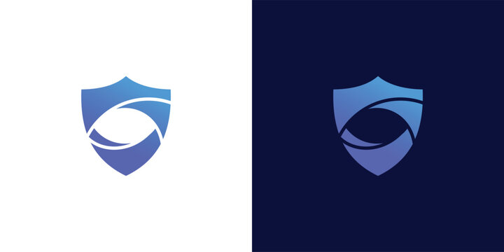 Abstract shield logo design with eye symbol for  protection