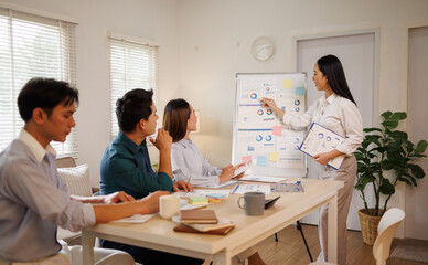 Fototapeta premium Business planning meeting discussing data for marketing strategy
