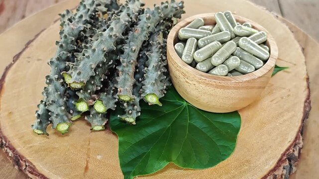 Heart leaved moonseed, Tinospora cordifolia. Thai herb capsules.