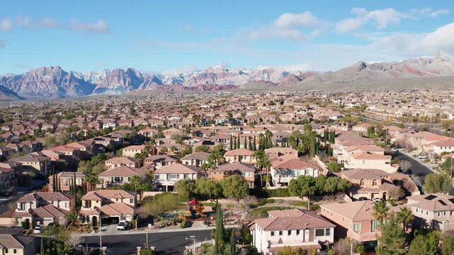 Summerlin Las Vegas suburb with Red Rock Canyon background Aerial Pullback View