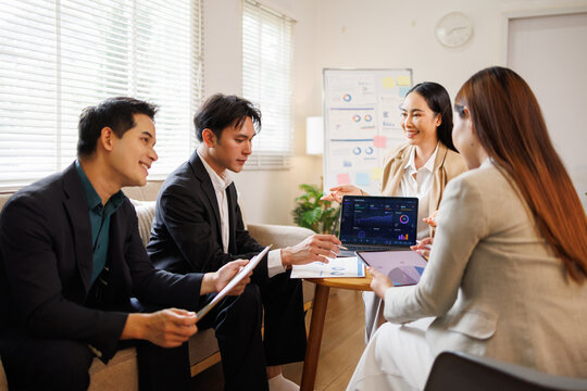 Business team analyzing data during startup meeting