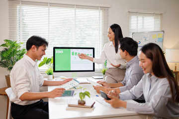 Fototapeta premium Business team analyzing esg data for sustainable strategy