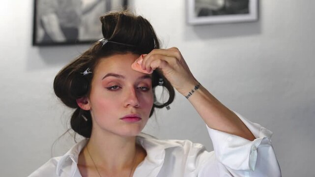 Female preparing for the day with simple beauty and hair routine