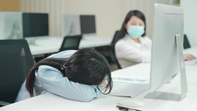 Sleeping fatigued business woman overtime work burnout, tired exhausted female employee feeling energy depletion exhaustion, overworked stressed, headache lying at desk in office with eye closed