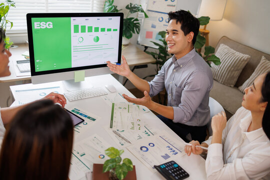 Business team discussing esg data and sustainable investment strategy
