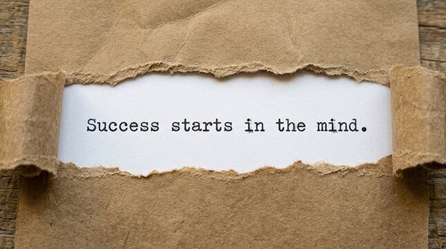 Success Starts in the Mind: A handwritten message is revealed through a torn paper. Emphasizing personal empowerment and achieving life goals. 