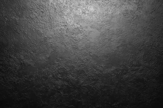 A textured black surface with subtle variations, creating a rich, moody aesthetic perfect for backgrounds or artistic projects.