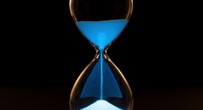 Hourglass with blue sand flowing.