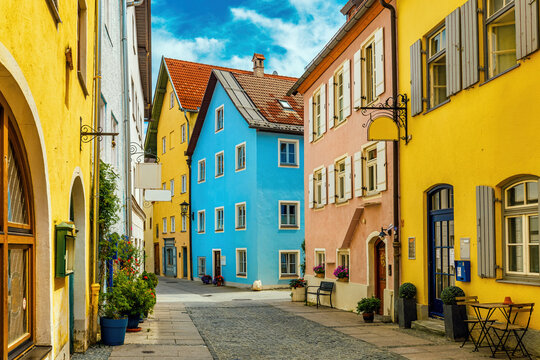 Cobblestone street and traditional colorful houses in Fussen, Bavaria, Germany.