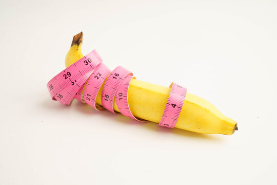 Banana with measuring tape, penis health.