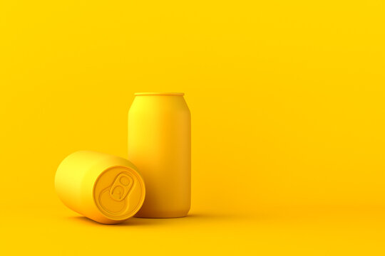 Yellow monochrome soda cans on monochromatic background