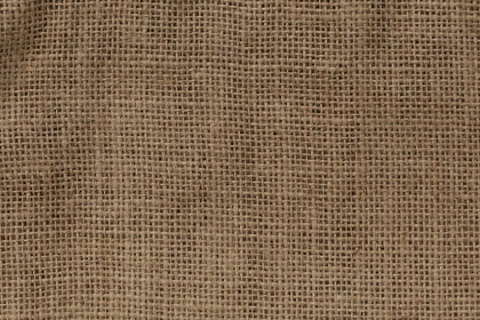 Brown sackcloth fabric texture or background, horizontal shape