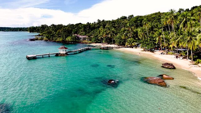 Discover the natural beauty of Koh Kood Island with its clear turquoise waters and lush palm trees. Enjoy a peaceful day at the beach, perfect for relaxation and exploration.