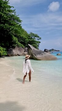 Experience a tranquil moment on the stunning beaches of Similan Islands Thailand.