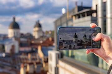 Smartphone photography of Transfiguration Church domes in Lviv old town © Ruslan