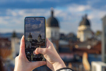 Smartphone photography of Transfiguration Church domes in Lviv old town