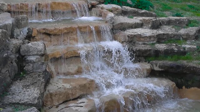 Artificial Waterfall Cascading Down Decorative Stone Steps