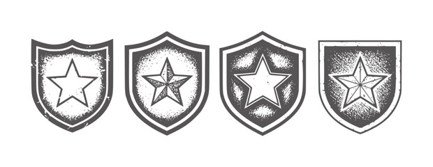 Obraz premium Four distressed shield emblems with stars in dark gray badge insignia