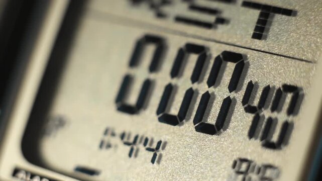 Digital timer and stopwatch running on a digital watch lcd display