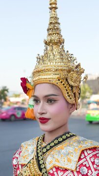 Thai Khon Dancer in Traditional Costume Near Wat Suthat in Bangkok
