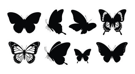 A collection of eight black and white butterfly silhouettes arranged neatly © Nayem