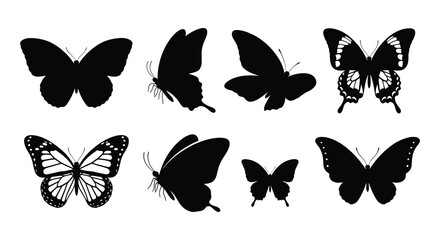 A collection of eight black and white butterfly silhouettes arranged neatly © Nayem