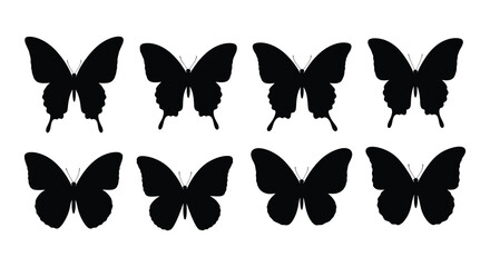 A collection of eight black and white butterfly silhouettes arranged neatly © Nayem