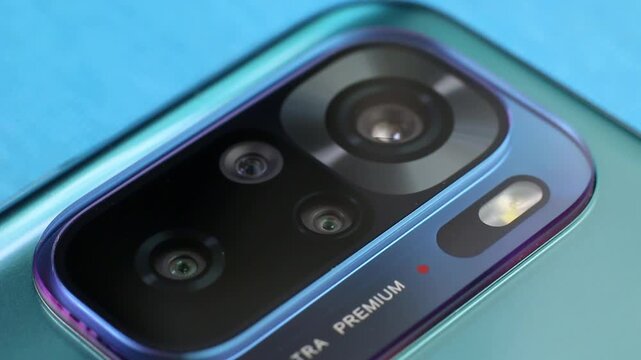 Macro close up of a smartphone camera lens on back
