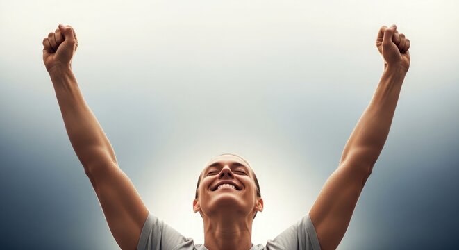 A person with arms raised in joyful celebration looking upwards with a bright hopeful expression against a light background