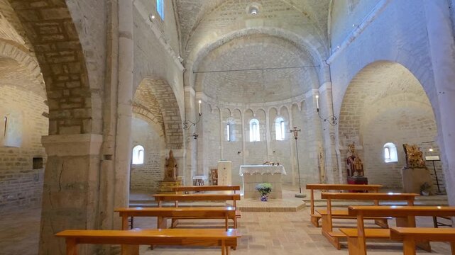 Interior of Sant'Urbano Abbey in Apiro, Italy: Medieval Romanesque Architecture with Stone Stairs, Vaults and 14th Century Fresco
