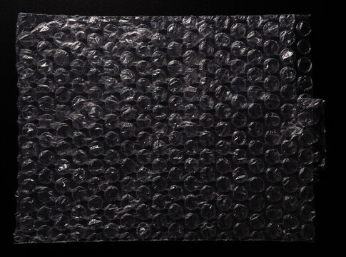 Bubble wrap texture on black background