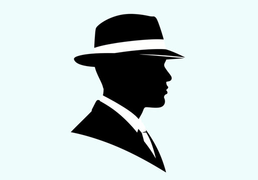 Silhouette of a man wearing a fedora hat