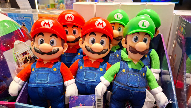 Group of Super Mario and Luigi plush toys displayed in a retail box on May 1, 2026 in Bangkok, Thailand.