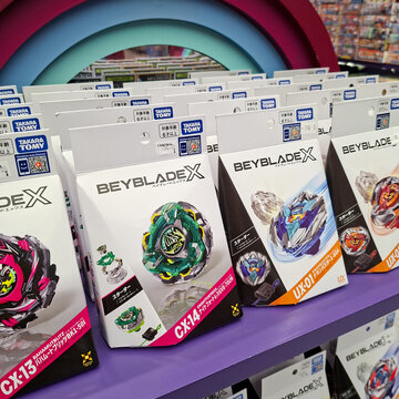 Takara Tomy Beyblade X spinning top toys arranged on a retail store shelf on April 19, 2026 in bangkok, Thailand.