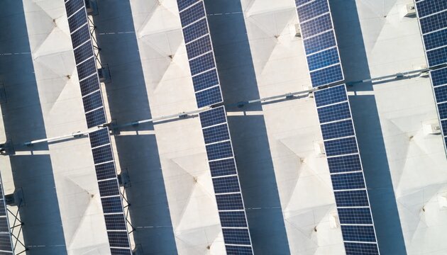 Aerial View of Solar Panels on Roofs from Drone Perspective