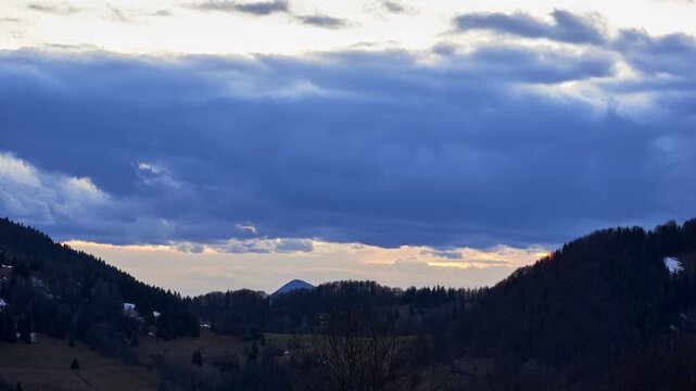 Title: Winter Twilight Mountain Timelapse with Dramatic Clouds