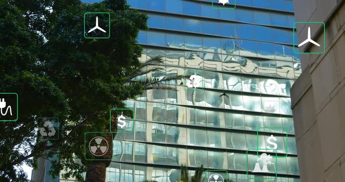 Vertical video: recycle wind icons appearing on glass tower as camera panning right, showing energy