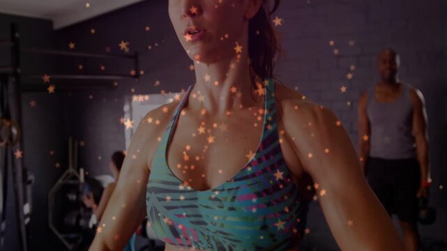 Fitness woman gripping bar and pulling upright row, star overlay showing building shoulder strength