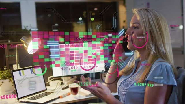 Mature woman speaking on smartphone, screens updating and projecting HUD charts for business