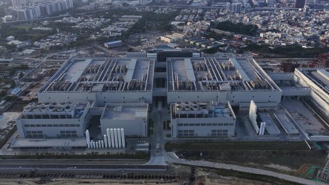 Aerial drone video of semiconductor manufacturing and foundry infrastructure
