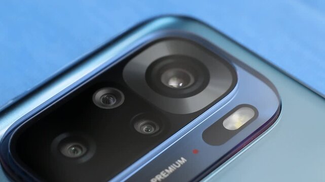 Macro close up of a smartphone camera lens on back
