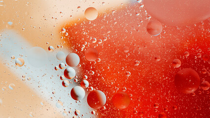 Obraz premium Oil bubbles creating vibrant abstract liquid background