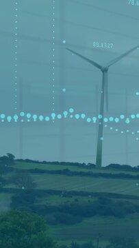 Vertical video: On teal band appearing, wind turbine spinning while graphs moving to show power