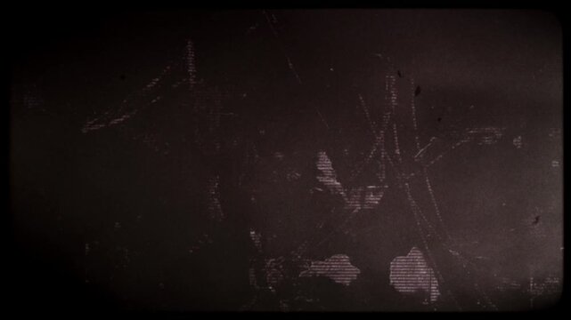 Flickering noisy grunge style film effect overlay loop.
