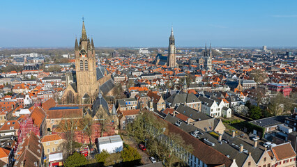 Obraz premium Historic city skyline of Delft with multiple church towers in the Netherlands
